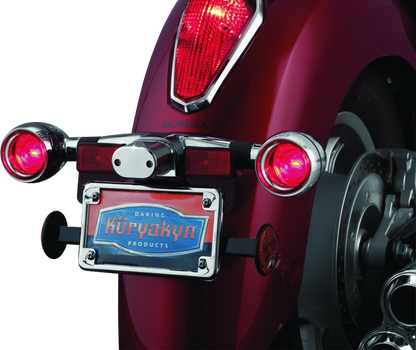 Kuryakyn Deep Dish Bezels with Red Lenses for Kawasaki Vulcan 2000 and Honda VTX1800 Series