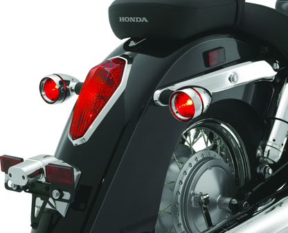Kuryakyn Deep Dish Bezels with Red Lenses for Kawasaki Vulcan 2000 and Honda VTX1800 Series